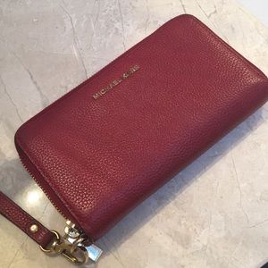 Gorgeous burgundy Michael Kors wristlet